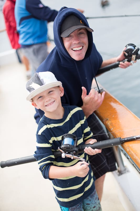 Two anglers, two rods, one rail.
