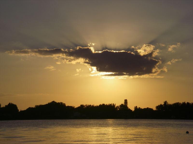 Gold behind a low cloud.