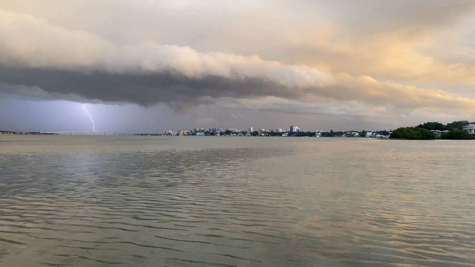 Lightning striking beyond the Ringling Bridge over Sarasota Bay