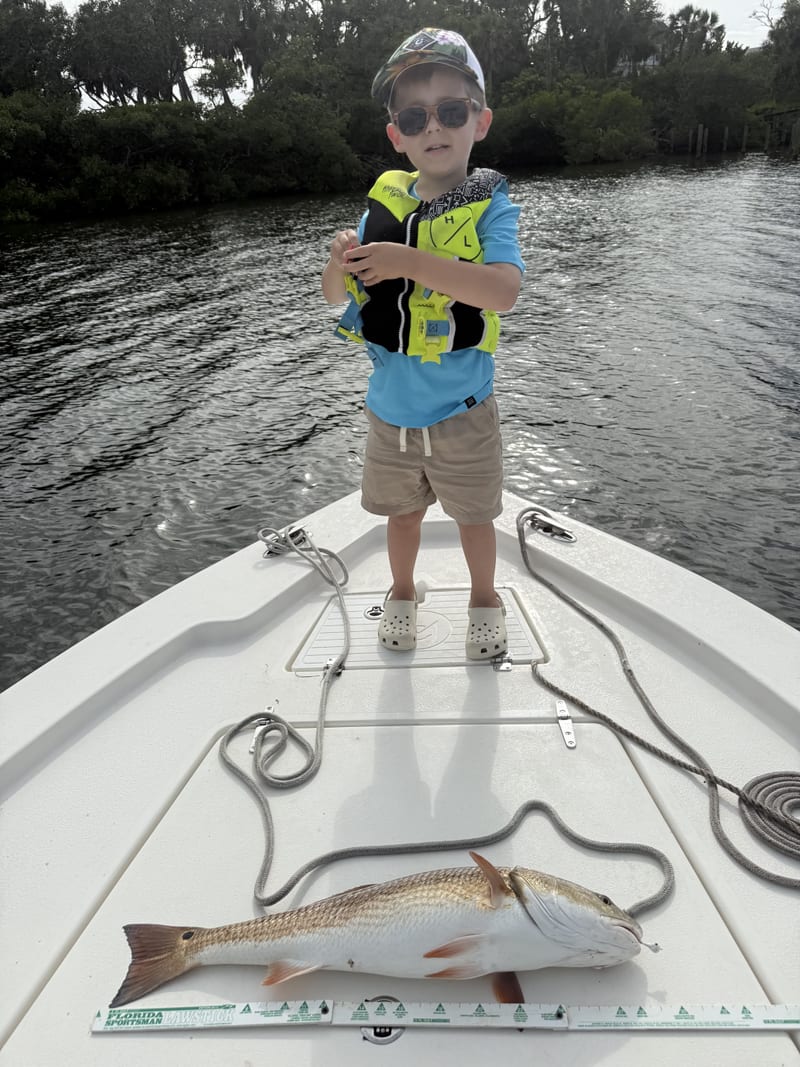 A young angler's redfish.