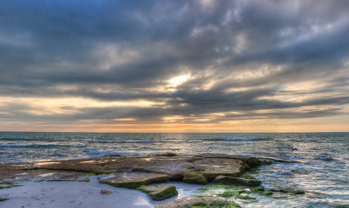 The beach's only natural rock reef holds snook and snapper.