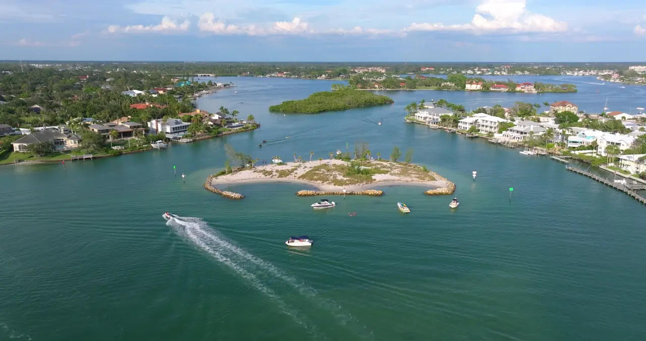 The sandbar is dry around low tide. We plan the trip around it.