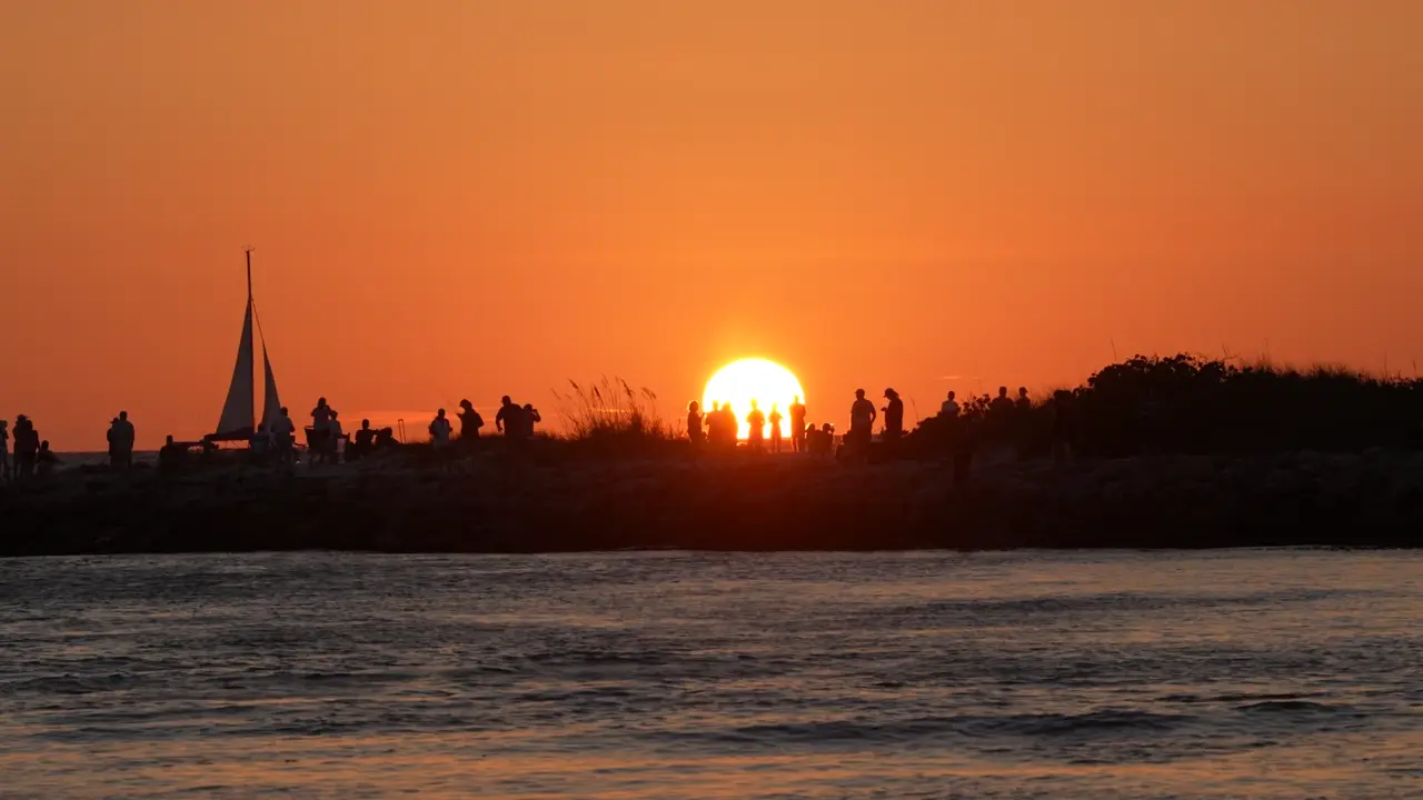 Jetty snook run May through September — rising tide, first and last light.