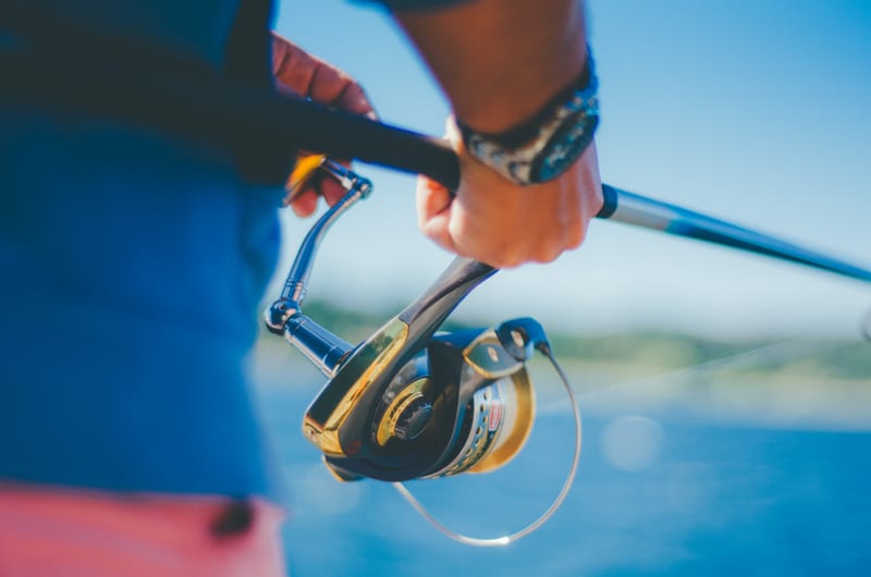 A spinning outfit on the water — the flats series fish redfish and snook on light tackle