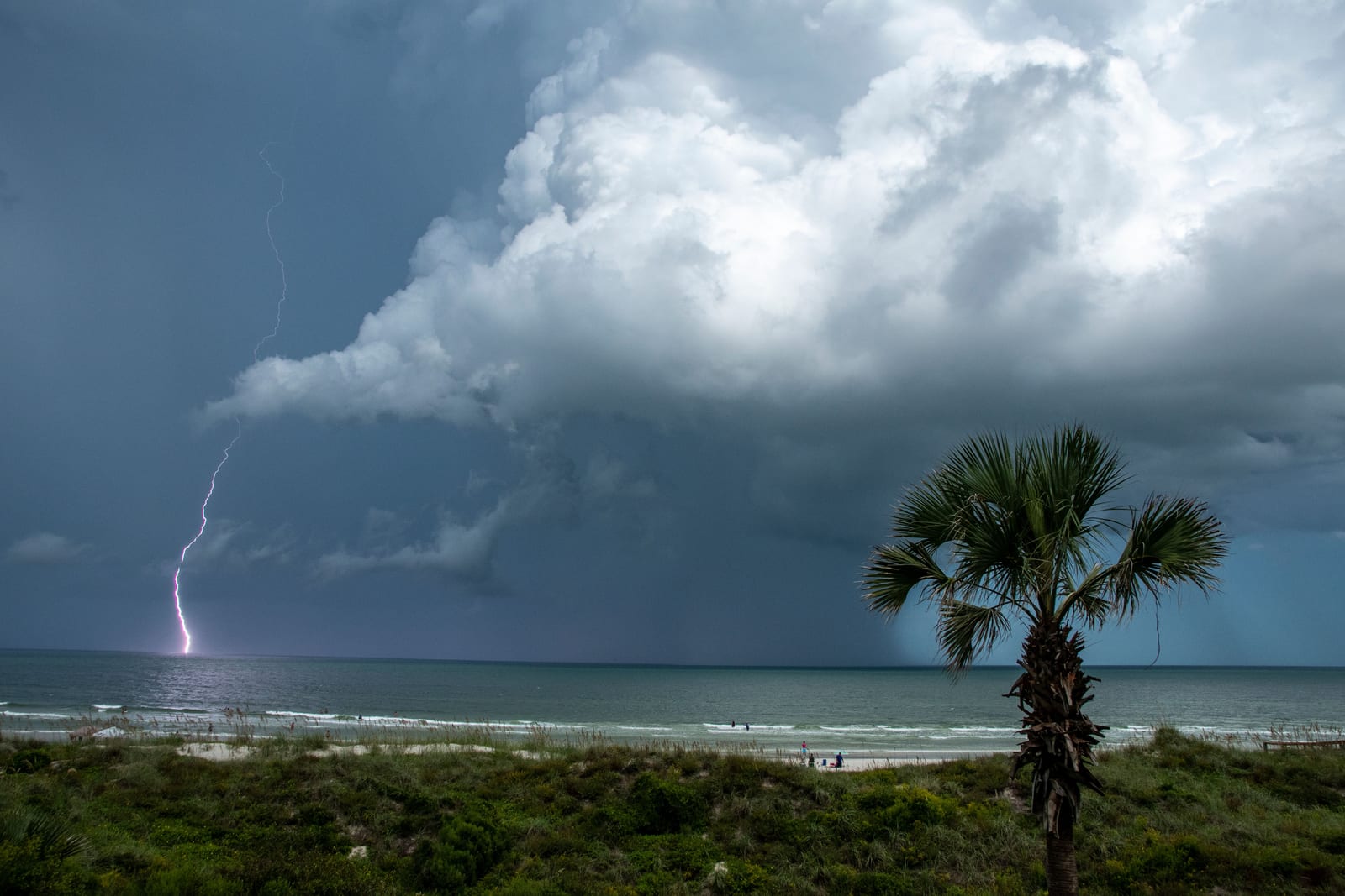 Wind and storms move the water the tables don't predict.