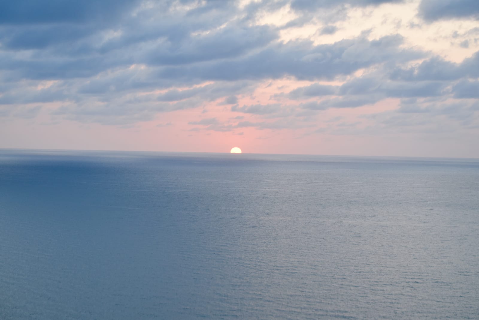 Clear the pass, and the reefs are minutes away.